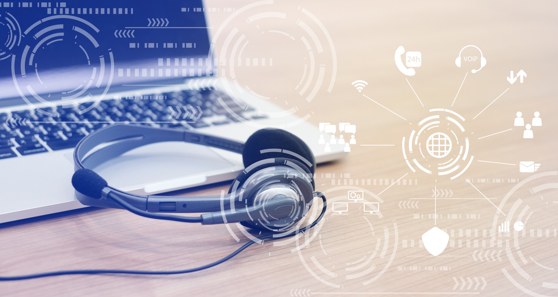 close up focus on call center headset device at headset VOIP system with futuristic symbol technology at office desk for hotline telemarketing and network operation concept